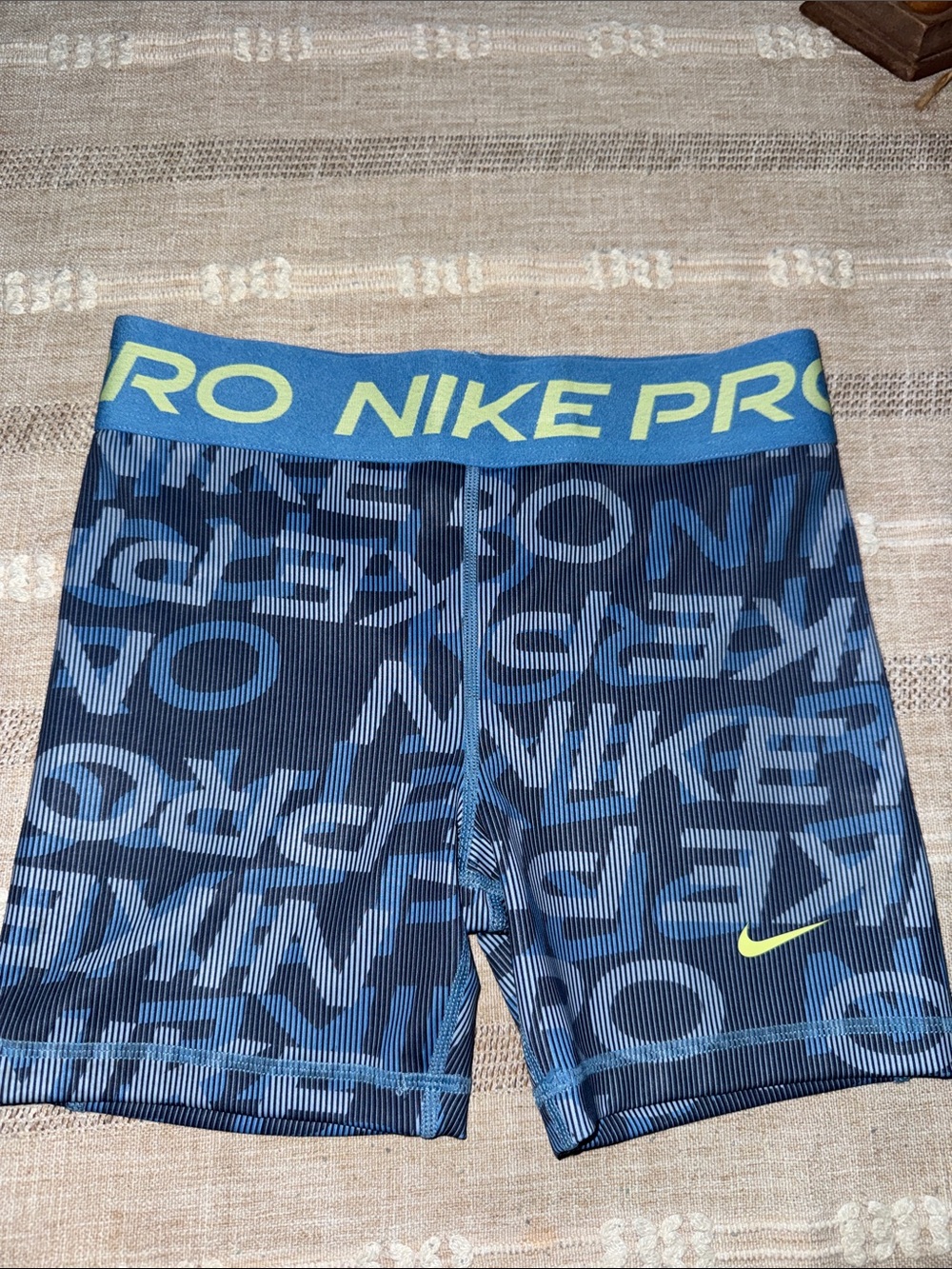 Nike Blue Compression Shorts with Neon Green Accents